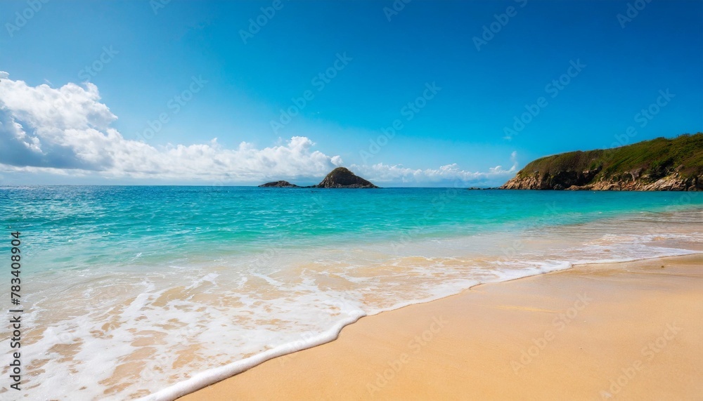 closeup of sandy beach with turquoise sea and sky background high quality photo