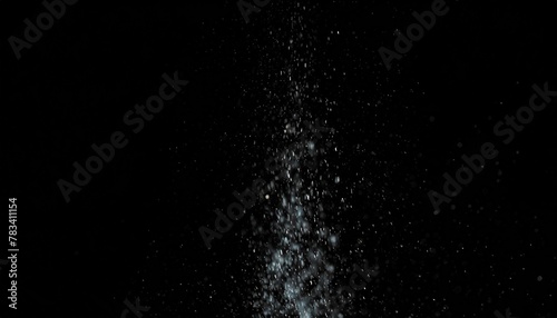 abstract splashes of water on a black background freeze motion of white particles rain snow overlay texture