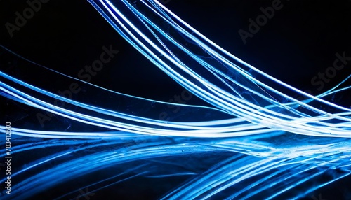 abstract neon blue lines on black background illuminated reflections on ground scene science sci fi and technology concept