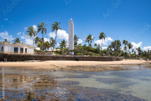 Praia do Forte lighthouse in Bahia and natural pools in the sea.