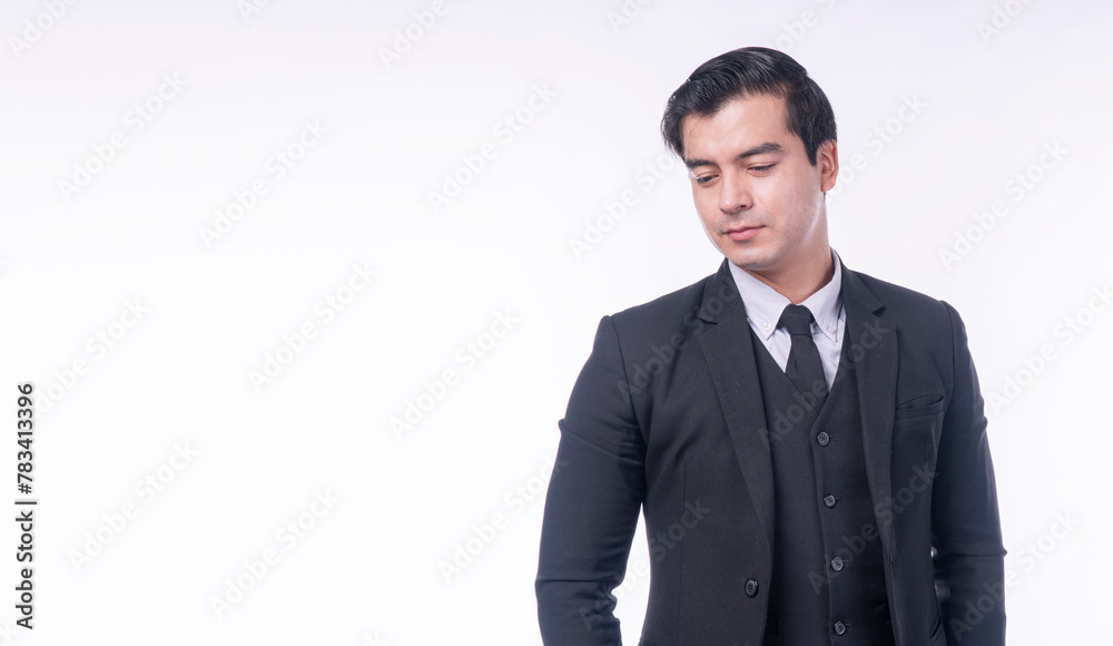 Thoughtful serious businessman pensive problem standing over isolated white background. Trouble occupation career job young man wear black suit worry thinking something tired sad looking copy space. Thoughtful serious businessman pensive problem standing over isolated white background. Trouble occupation career job young man wear black suit worry thinking something tired sad looking copy space.