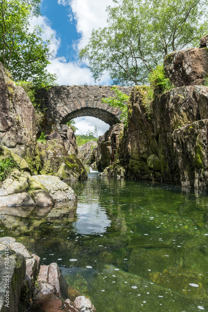 Birks Bridge in the Duddon Valley on a beautiful Summer day. Birks Bridge in the Duddon Valley on a beautiful Summer day.