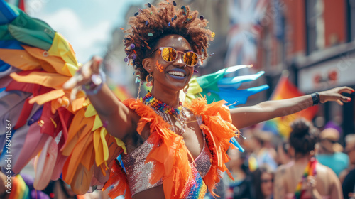 A black street performer with fancy costume entertaining a diverse crowd during Pride festivities, pride month parade photo