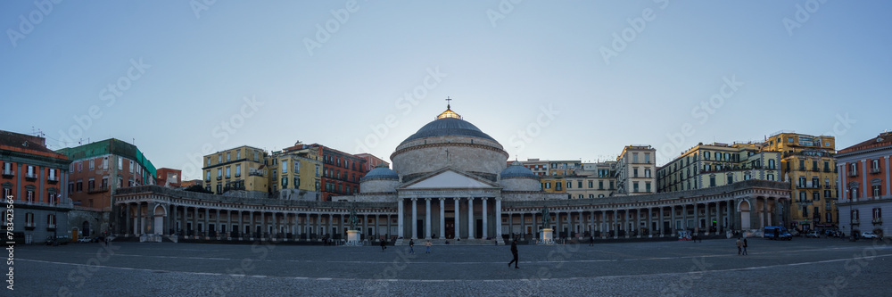 Cityscape of town square Piazza del Plebiscito with Basilica San Francesco di Paola under a clear blue sky, Naples, Campania, Italy