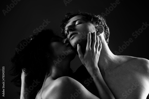 Fototapeta Naklejka Na Ścianę i Meble -  Couple in love kissing. Valentines day. Passionate kiss. Romantic moment. Tender lovers. Couple embrace and kissing. True love. Loving embrace. Dreamy kiss. Romantic kissing. Love in a kiss.