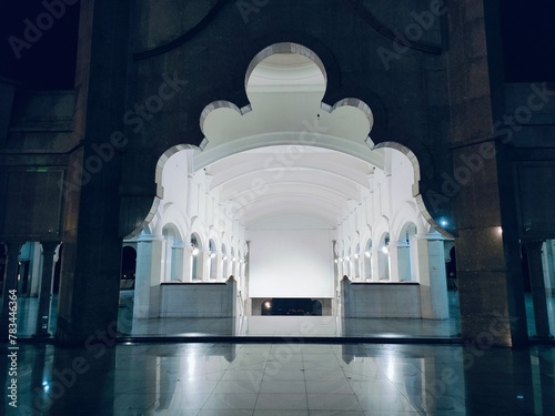 Canvas Print Night views of the illuminated entrance of Masjid Wilayah Persekutuan mosque in Kuala Lumpur can be viewed from various perspectives