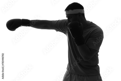 Silhouette of sporty young man in boxing gloves on white background