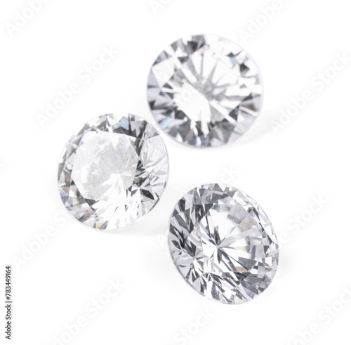 Three beautiful shiny diamonds isolated on white