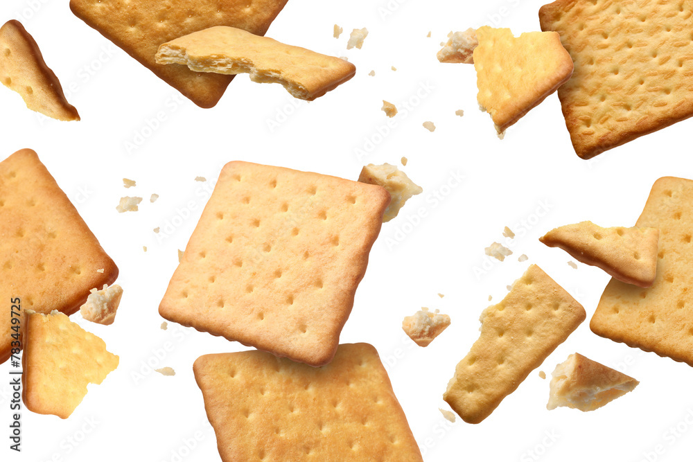 Tasty dry crackers falling on white background Tasty dry crackers falling on white background