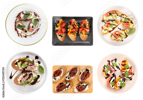 Set of delicious bruschettas with balsamic vinegar isolated on white, top view