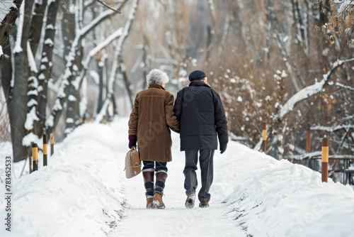 Captivating Elderly Couple Walking on a Snowy Path: Essential for an Engaging and Warm Visual Experience