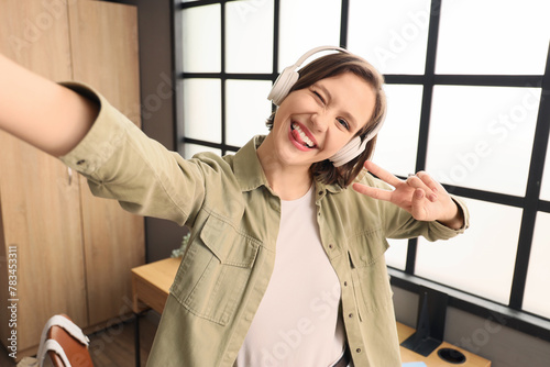 Female student in headphone...
