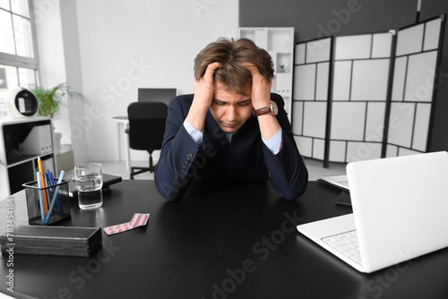 Stressed young businessman ...