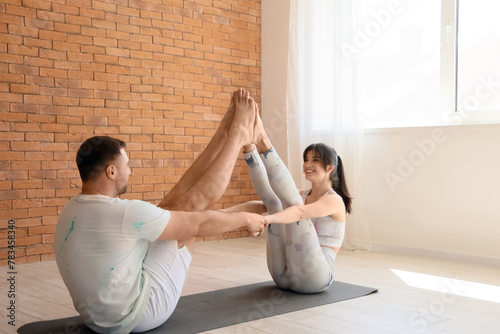 Sporty young couple practic...