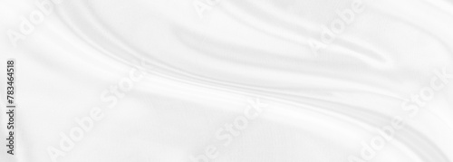 White gray satin texture that is white silver fabric silk panorama background with beautiful soft blur pattern natural. © Kamjana