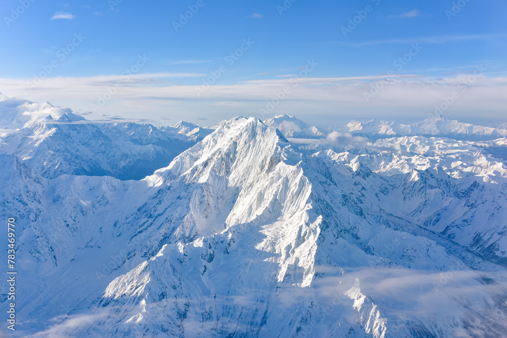 Aerial view of snow capped mountains in Sichuan and Tibet, China Aerial view of snow capped mountains in Sichuan and Tibet, China