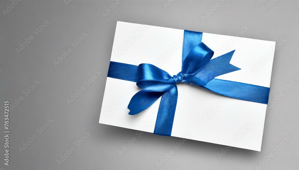 gift card with blue ribbon, blue gift card with a vibrant black ribbon bow right side, a minimalist grey background with subtle shadowing.