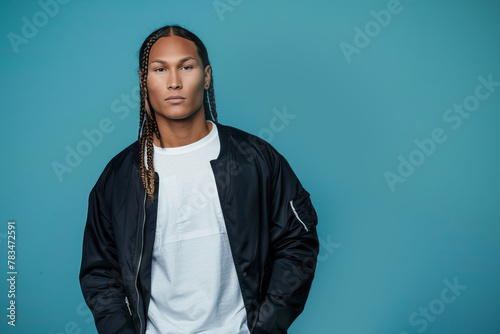 Attractive young native north american man with braided hair