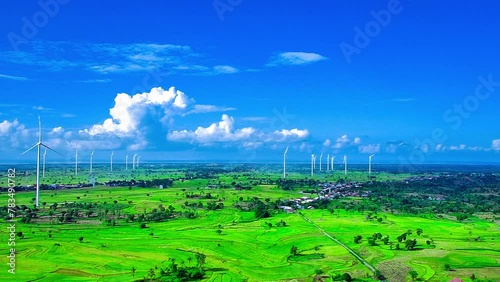 Aerial view of a wind-powered power plant that stops rotating after heavy rain photo