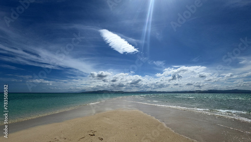 sandbank in Fiji under blue couldy sky photo