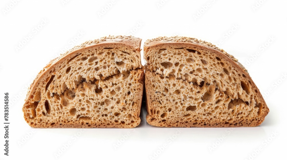 Fresh whole grain bread cut in half on white background Fresh whole grain bread cut in half on white background
