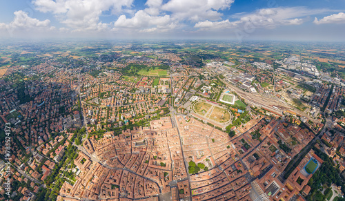 Modena, Italy. Historical Center. Panorama of the city on a summer day. Sunny weather with clouds. Aerial view © nikitamaykov