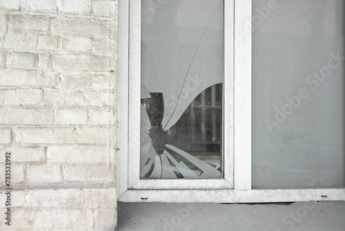 Broken window in an old building