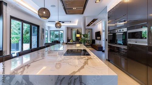 A luxurious marble countertop gleaming in a modern kitchen with sleek appliances.