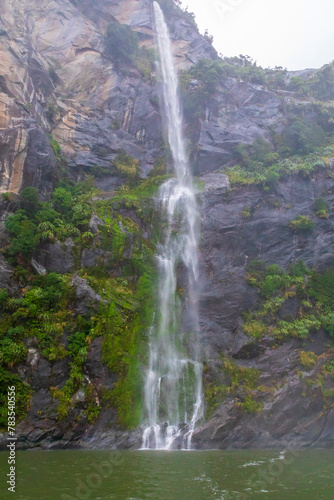 Photograph of Water Falls after very heavy rain and cold weather in Milford Sound in Fiordland National Park on the South Island of New Zealand