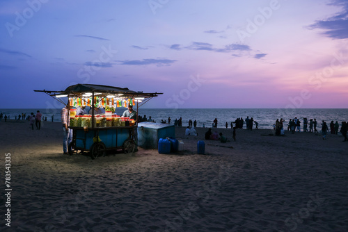 Kozhikode beach night view sunset in Kerala India. Food snacks stalls street food Kozhikode beach.