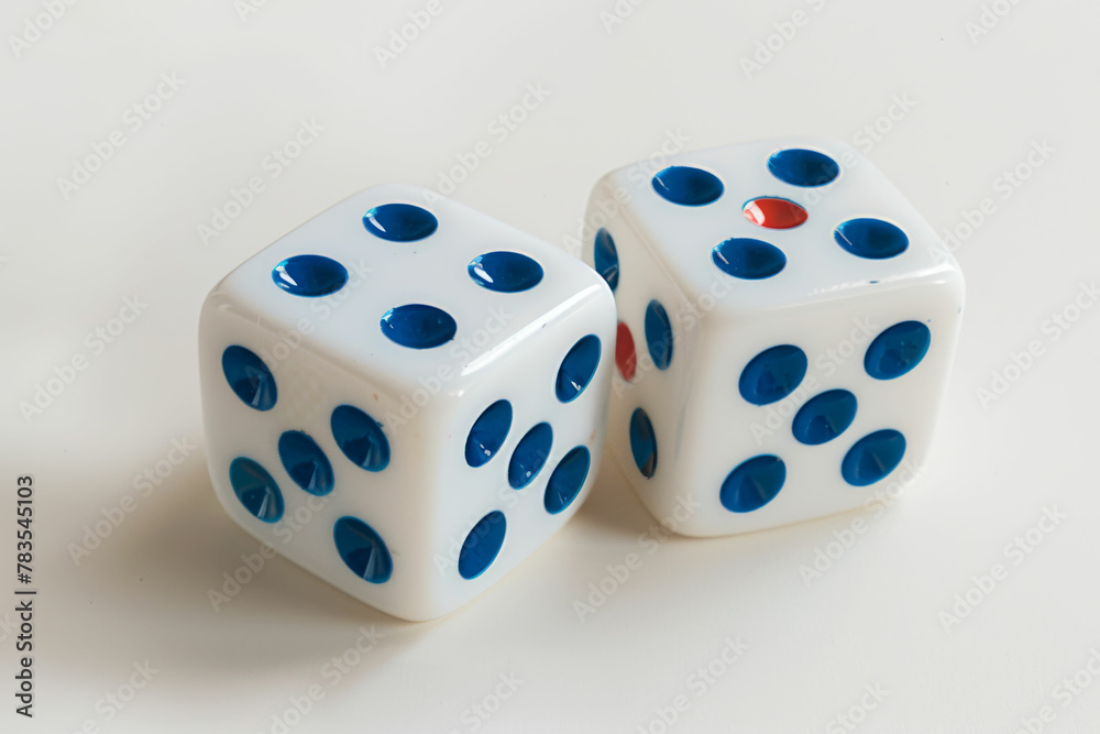 two white dices with blue dots on them two white dices with blue dots on them