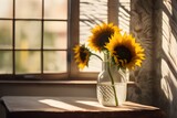  Sunflower takes center stage in glass vase with slender stem.