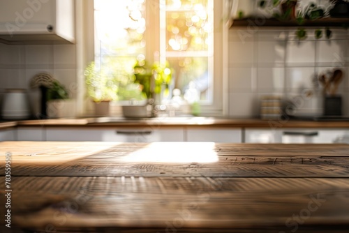 Blurred Kitchen Background with a Wooden Table Top for Product Display and Space on the Left Side. Concept of a Clean Modern Home Interior with Morning Light from the Window. Close Up View. 