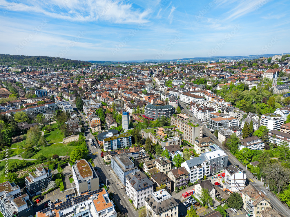 Obraz premium Aerial view of Swiss City of Zürich with cityscape and skyline on a sunny spring day. Photo taken April 12th, 2024, Zurich, Switzerland.