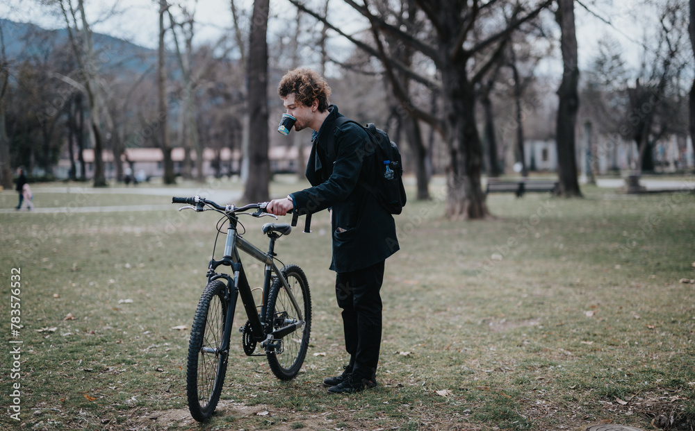 Corporate professional unwinds biking in a tranquil park setting, embracing a work-life balance