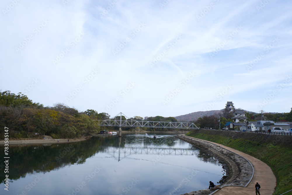 Okayama, Japan - December 9, 2023: Okayama castle and Asahi River in Okayama city Okayama, Japan - December 9, 2023: Okayama castle and Asahi River in Okayama city
