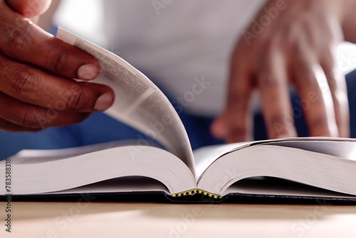African American woman holding black bible