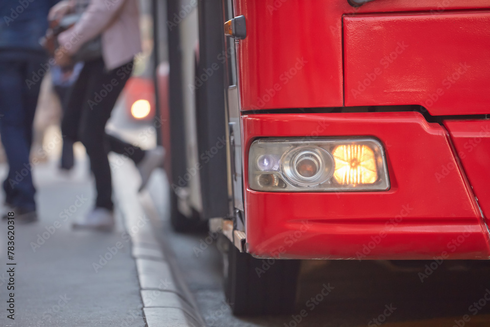 Fototapeta premium Public transportation bus in urban surroundings.