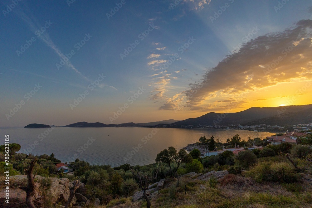 Beautiful sunset over the coastal town. Beautiful sunset over the coastal town.