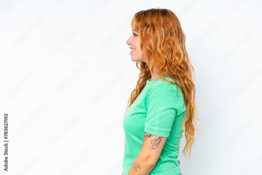 Young caucasian woman isolated on white background in lateral position Young caucasian woman isolated on white background in lateral position