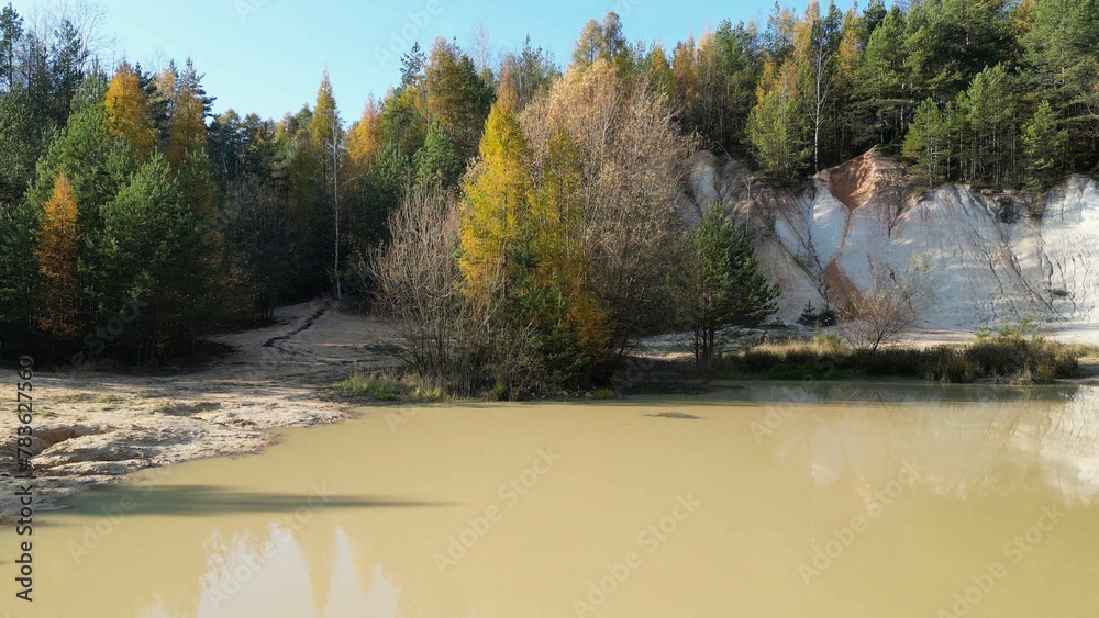 Fototapeta premium Drone shot of a sand quarry on a sunny autumn day