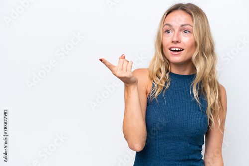 Young Russian woman isolated on white background intending to realizes the solution while lifting a finger up