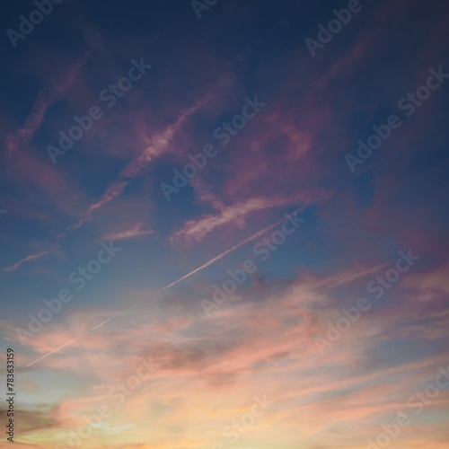 Beautiful shot of a blue sky with pink clouds at sunset