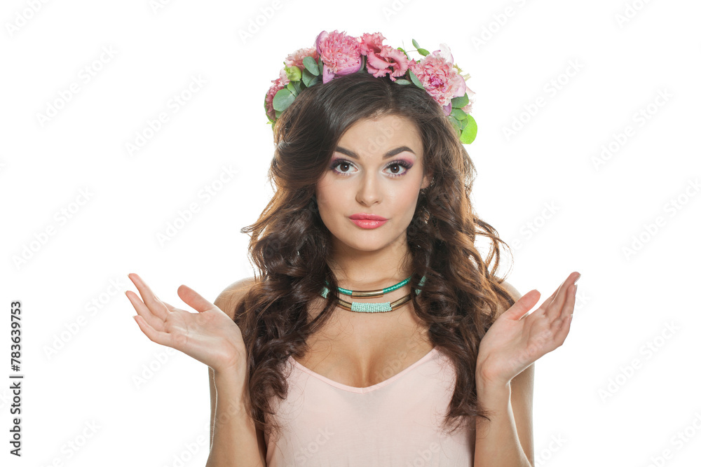 Shocked brunette woman with fresh flower on her head. Spring, cosmetic, beauty, skin care and hair care concept Shocked brunette woman with fresh flower on her head. Spring, cosmetic, beauty, skin care and hair care concept