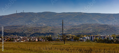 Landscape view of Skopje country on a background of a Vodno mountain with a cross on a peak