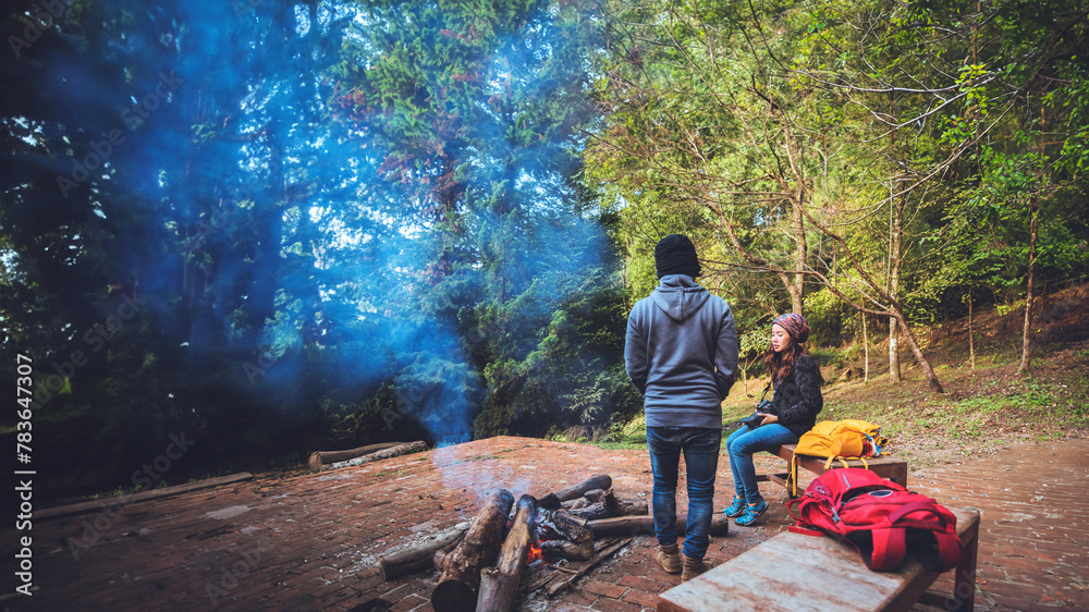 Couple travel photograph nature on the mountains relax in the holiday. Romance lovers Camp Fire winter Couple travel photograph nature on the mountains relax in the holiday. Romance lovers Camp Fire winter