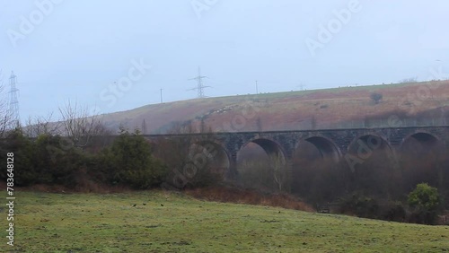 Scenic view of the Nine Arches Bridge over the Sirhowy river, Nantybwch, Wales photo