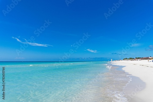 Photography Clear blue sky over turquoise sea water and white sandy beach in Varadero, Cuba