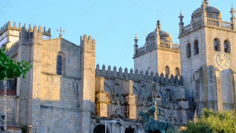 Scenic shot of the Roman church Porto in Portugal with beautiful stone architecture and sunlight