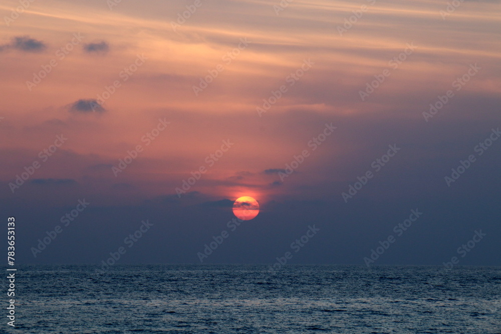 Lighting and color of the sky above the horizon at sunset. Lighting and color of the sky above the horizon at sunset.